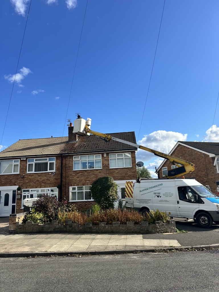 Spraying biocide on roof